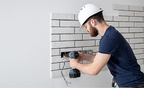 electricians-in-cedar-park-tx-installing-electrical-sockets